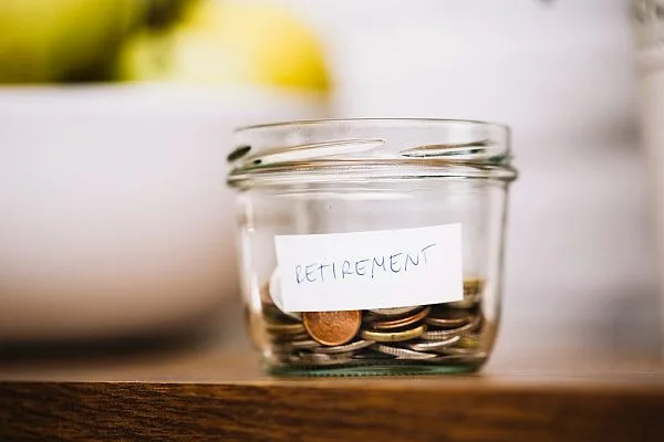 jar with pennies and retirement sticker